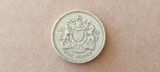 1983 QEll One Pound £1 Royal Arms Old Style Round Coin - Very Good Grade