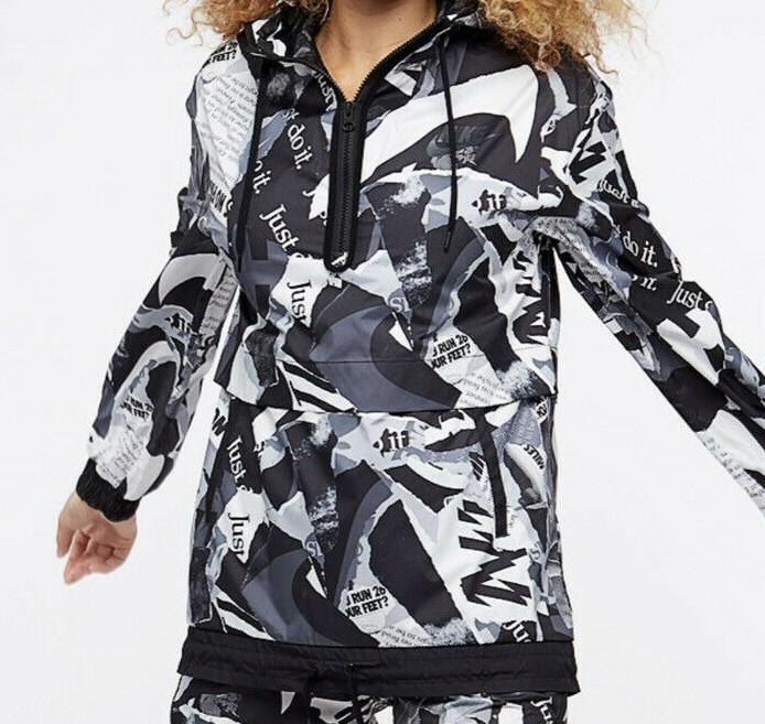 NIKE JUST DO IT ナイロンジャケット 　植物柄　Ｌサイズ NIKE Just Do It Newsprint Pullover Hooded Windbreaker 1/2