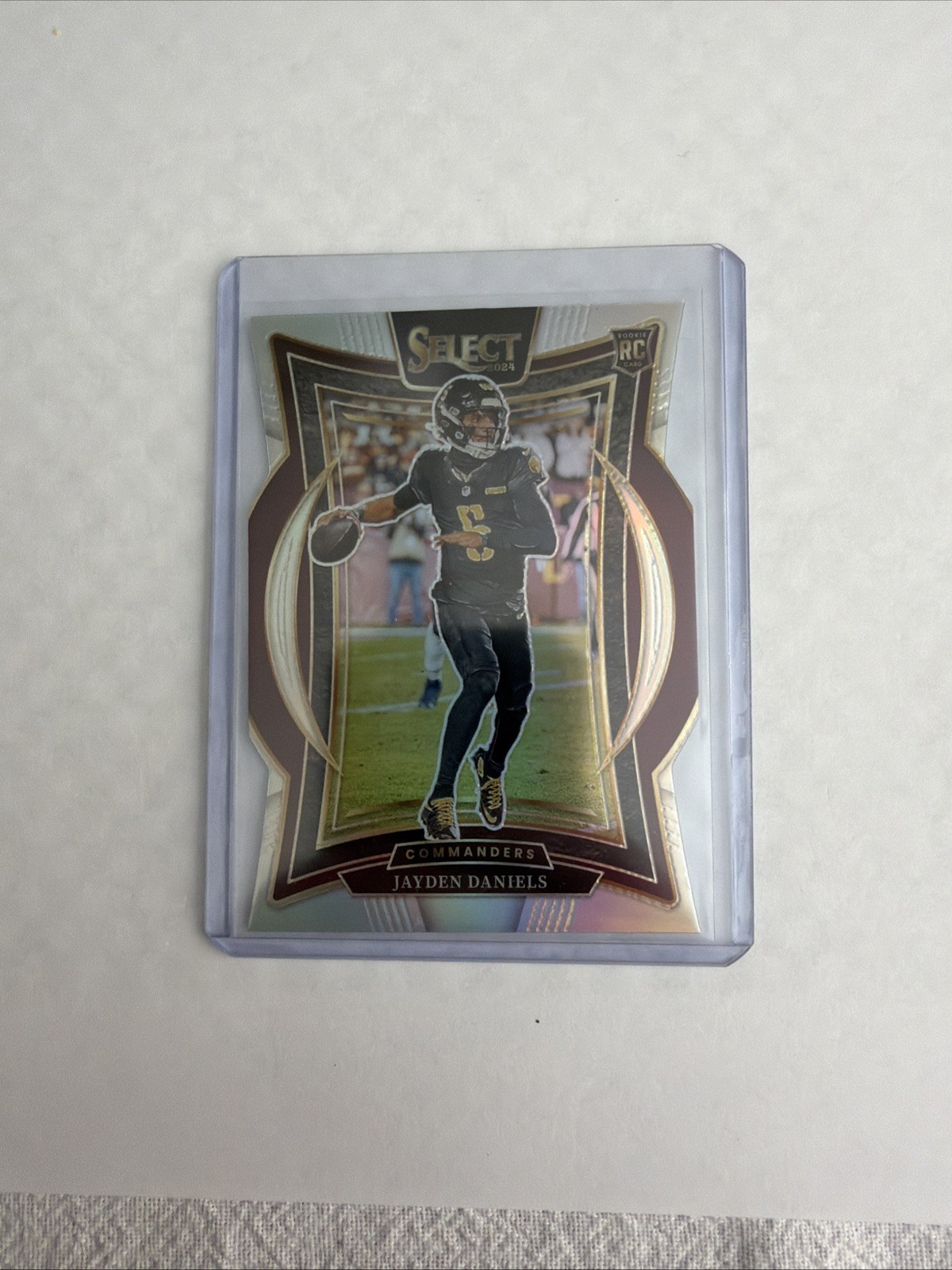 2024 Panini Select - Concourse Jayden Daniels #26 Silver Prizm Die-Cut (RC)