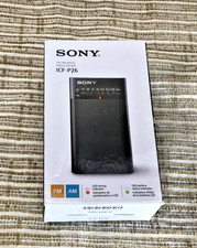 New in Box Sony ICF-P26 Portable AM/FM Radio w Ear Phones Black