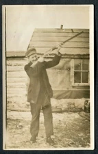 Real Photo Postcard - Hunter Posing with Rifle