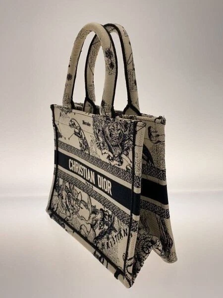 Petit sac fourre tout livre Dior serviette de juy broderie zodiaque latte noir femme