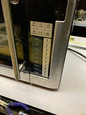 OSTER 1.1 CU. FT. COUNTERTOP MICROWAVE OVEN pre owned