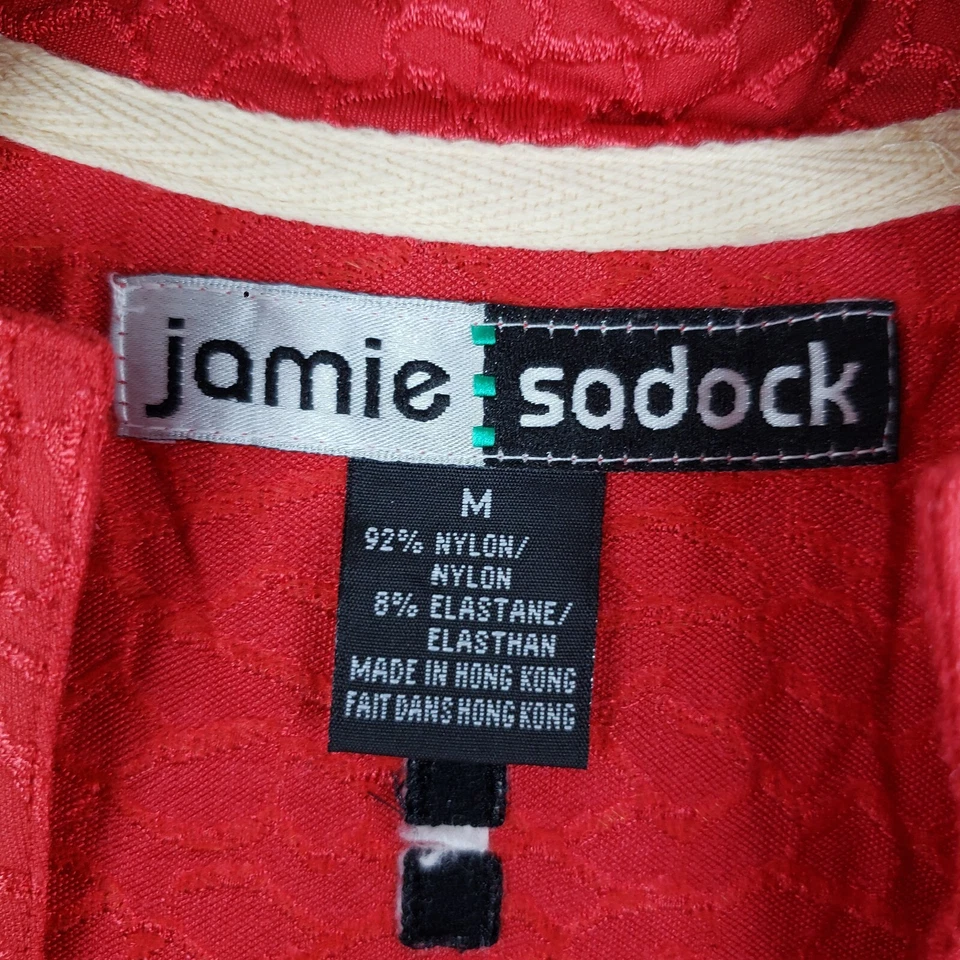 Camiseta de golf Jamie Sadock para mujer roja mediana geométrica 1/4 botón elástica Foto 2 de 4