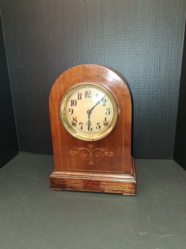 ANTIQUE MAHOGANY GILBERT CLOCK WITH WOOD INLAY.