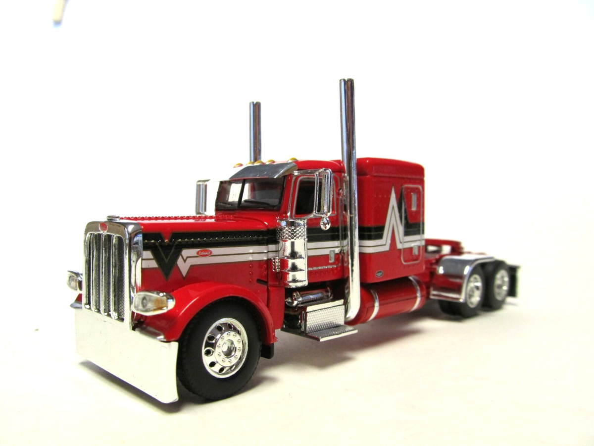 DCP FIRST GEAR 1/64 SCALE 389 PETERBILT FLAT TOP, RED WITH BLACK