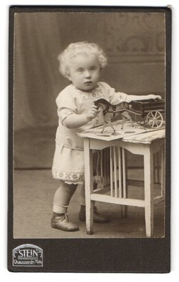 Photograph F. Stein, Berlin, cute blonde child with wooden horse and cart a 