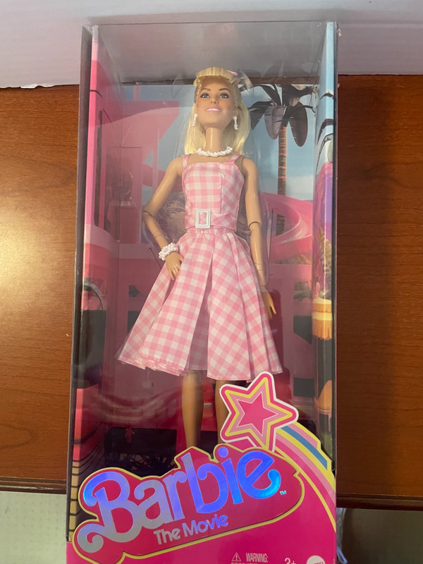 Barbie The Movie Doll Wearing PINK & WHITE GINGHAM DRESS New in the Box
