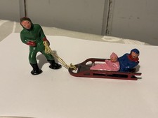 VINTAGE LEAD BARCLAY "Man Pulling Children on Sled" Near Mint Xmas Winter 1946