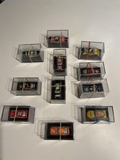 Lot Of 11 1:64 scale NASCAR die-cast model cars With Cases