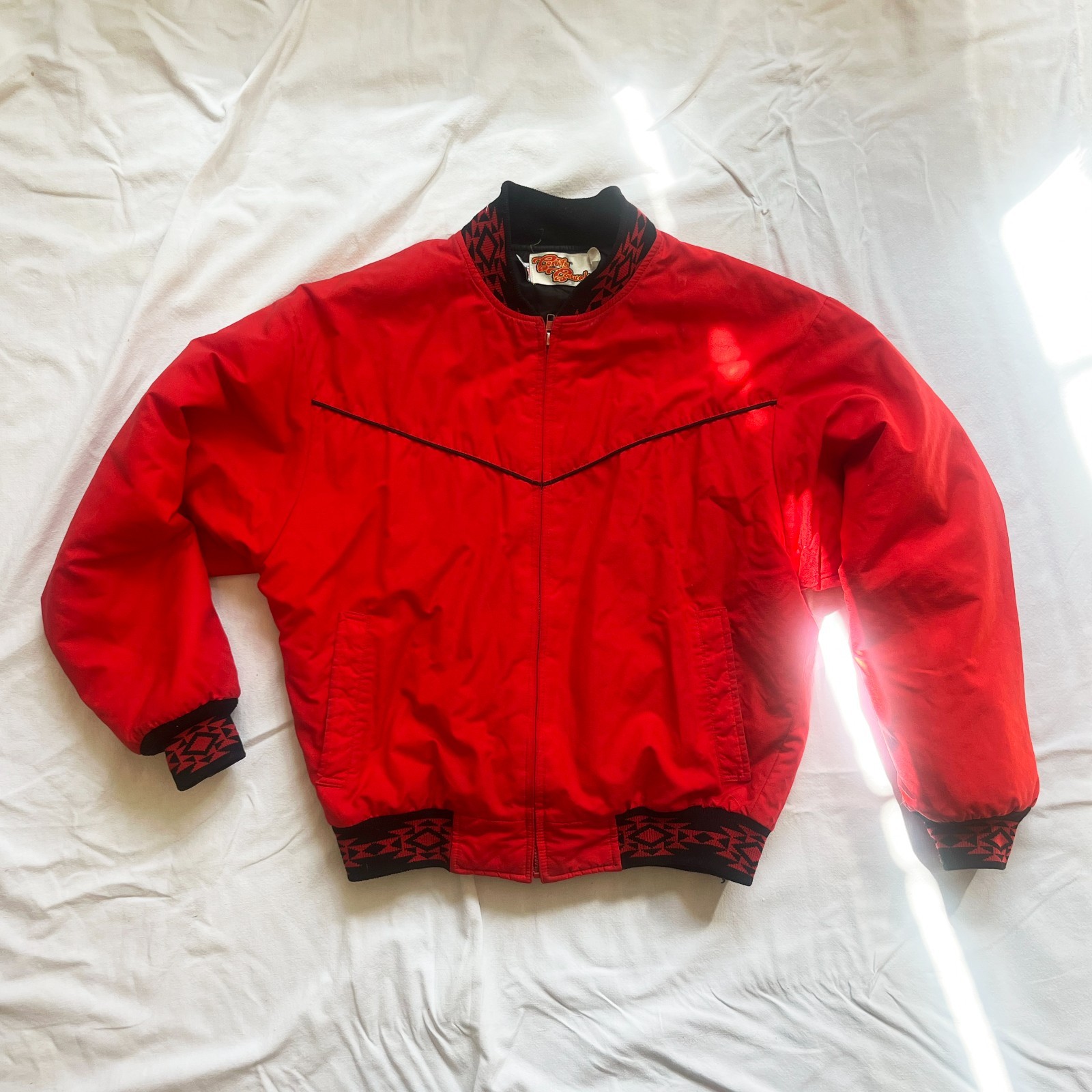 Red Vtg Comfy Casuals zip up jacket size M with western yoke, floral border, and angled front zipper closure.