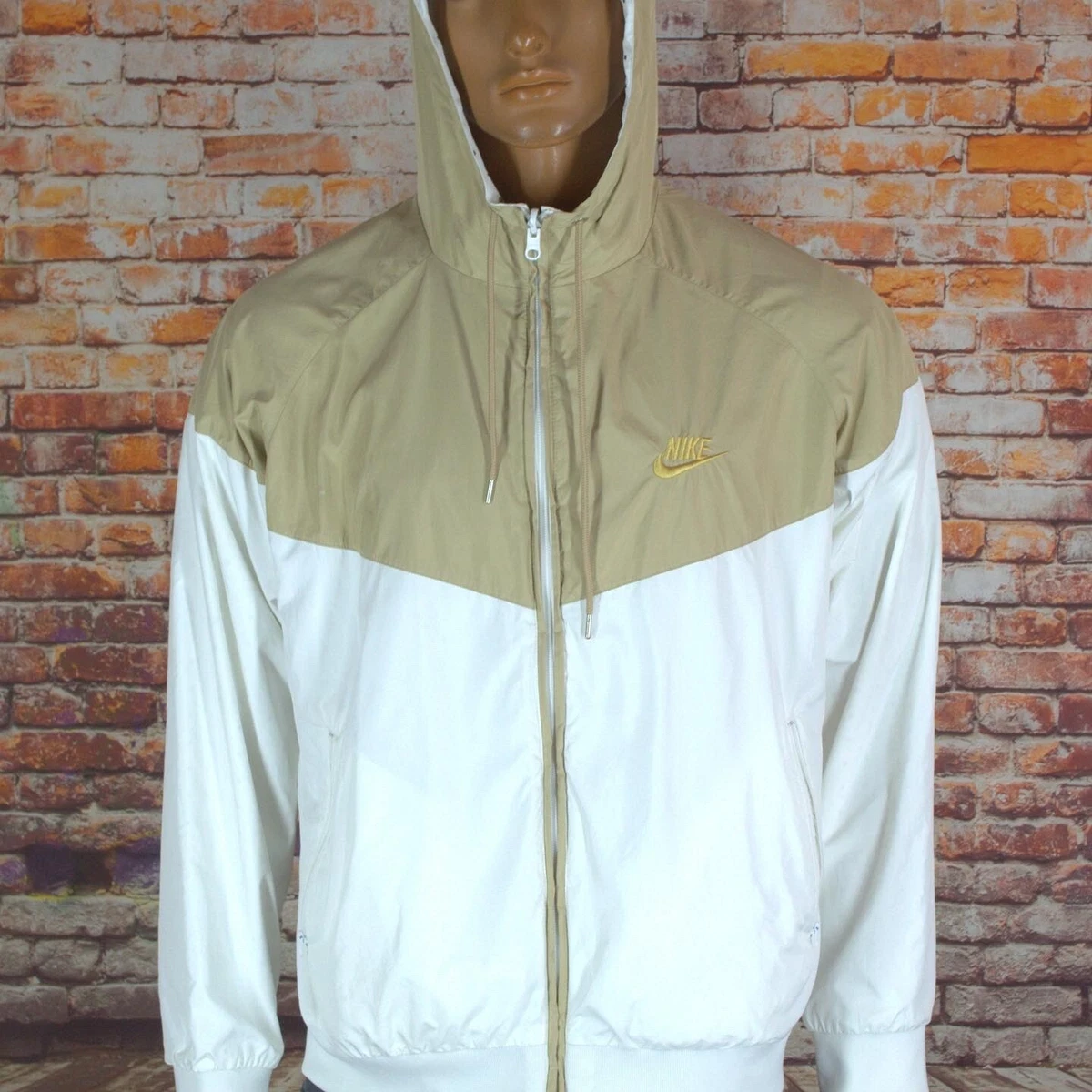 White nike windbreaker clearance with gold logo