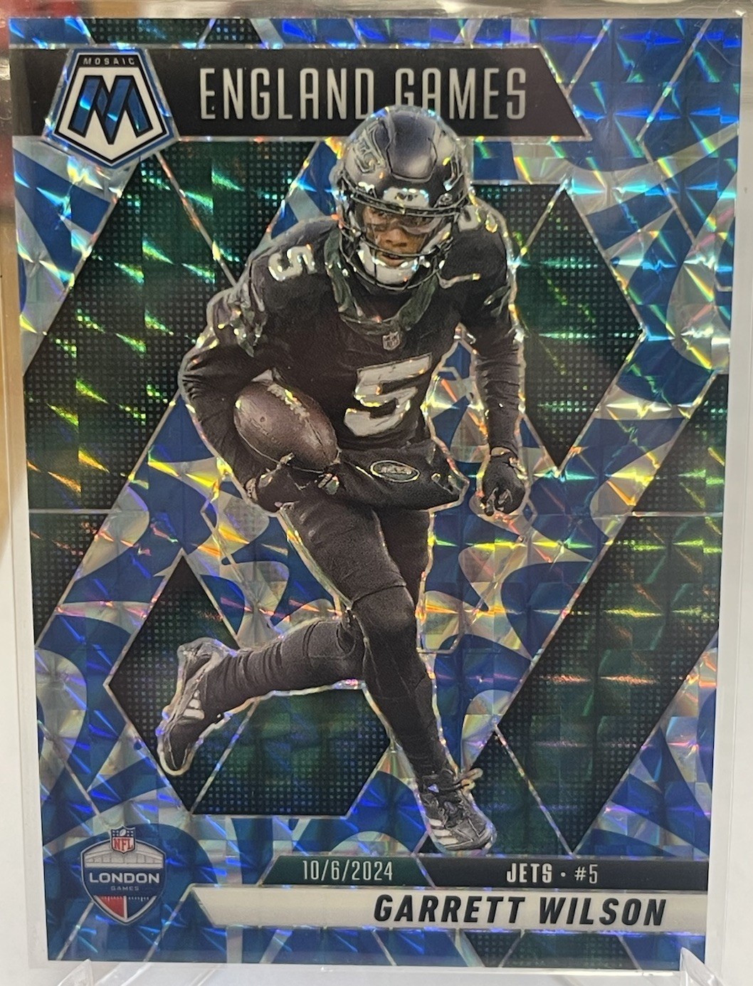 2025 Panini Mosaic #252 Garrett Wilson Mosaic Reactive Blue NEW YORK JETS