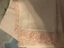 drap rose clair brodé