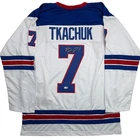 Autographed/Signed Brady Tkachuk USA 2026 Olympics Gold White Jersey JSA COA