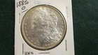 1885-O Morgan Silver Dollar with partial reverse toning