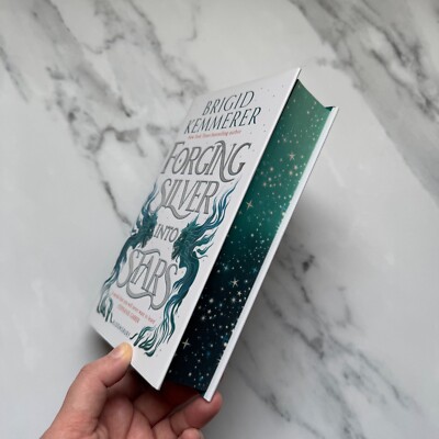 Fairyloot Exclusive - Forging Silver Into Stars by Brigid Kemmerer