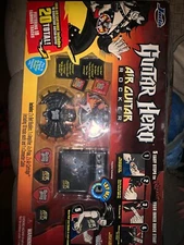 Guitar Hero Air Guitar Rocker Value Pack 2 belt buckles 20 Famous Songs Jada New