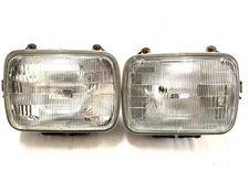 Jeep YJ Wrangler headlight buckets with chome retainer / bulbs 87-95 adjuster