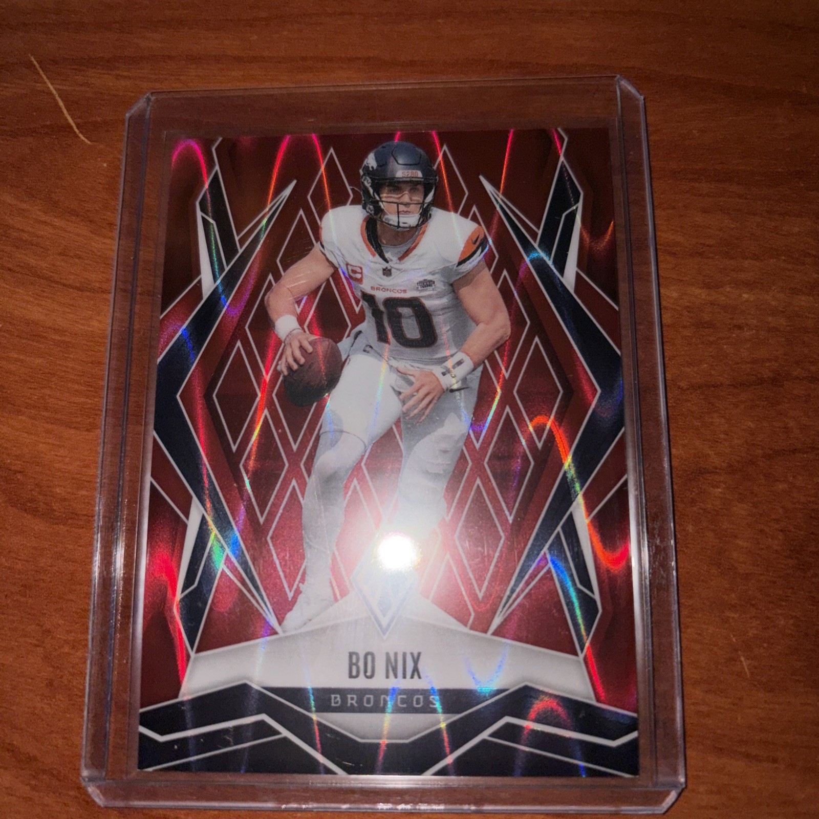 2024 Panini Phoenix - Rookies Bo Nix #159 Red /99 (RC)
