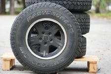 Used Mastercraft  30X9.50R15 LT TIRES WITH RIM