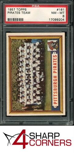 1957 TOPPS #161 PIRATES TEAM W/ ROBERTO CLEMENTE PSA 8