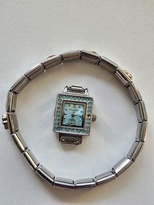 Nomination Stretcharmband  mit 6 Charms und Uhr