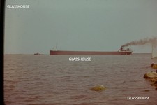GREAT LAKES BULK FREIGHTER BEING PULLED BY TUG BOAT, 1959 PHOTO SLIDE