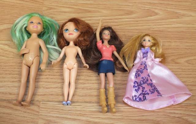 small dolls with long hair