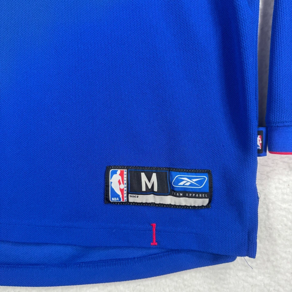 Camiseta deportiva de calentamiento de manga larga de baloncesto de la NBA Reebok Detroit Pistons para hombre M Foto 3 de 4