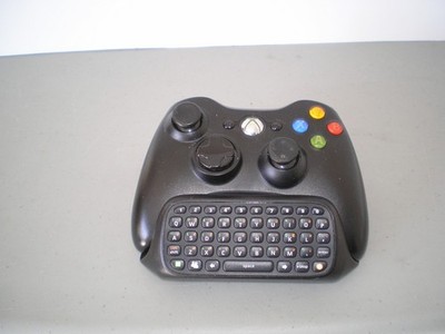 Microsoft Xbox 360 black hand controller with Chatpad keyboard