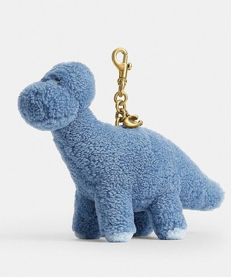 COACH Buddy Dinosaurier Taschenanhänger Lammfell CEG50 B4LJF Blau mit Hundele...