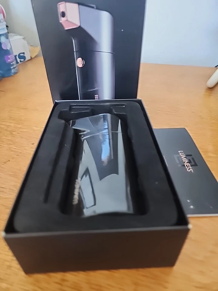 The Luminess Breeze Duo model comes in a sleek black color - Image 2 of 4