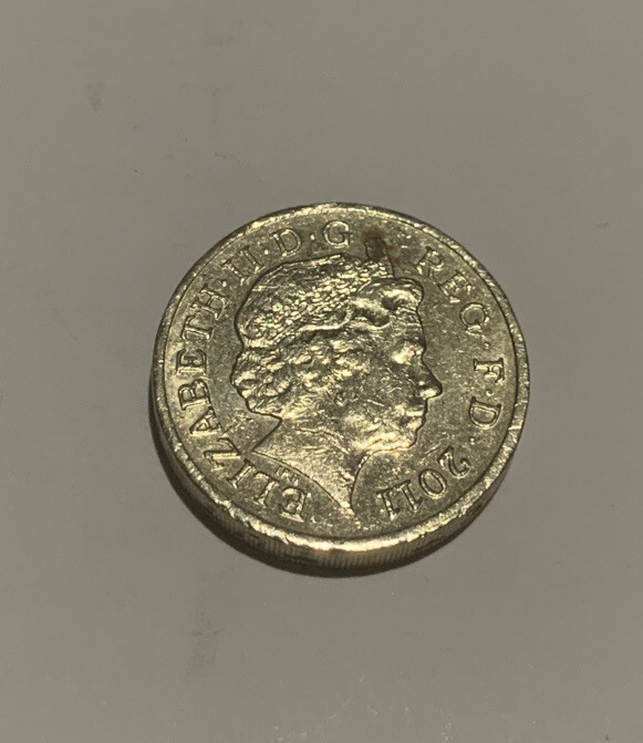 Preowned- Rare 2011 British One Pound Coin “DECUS ET TUTAMEN