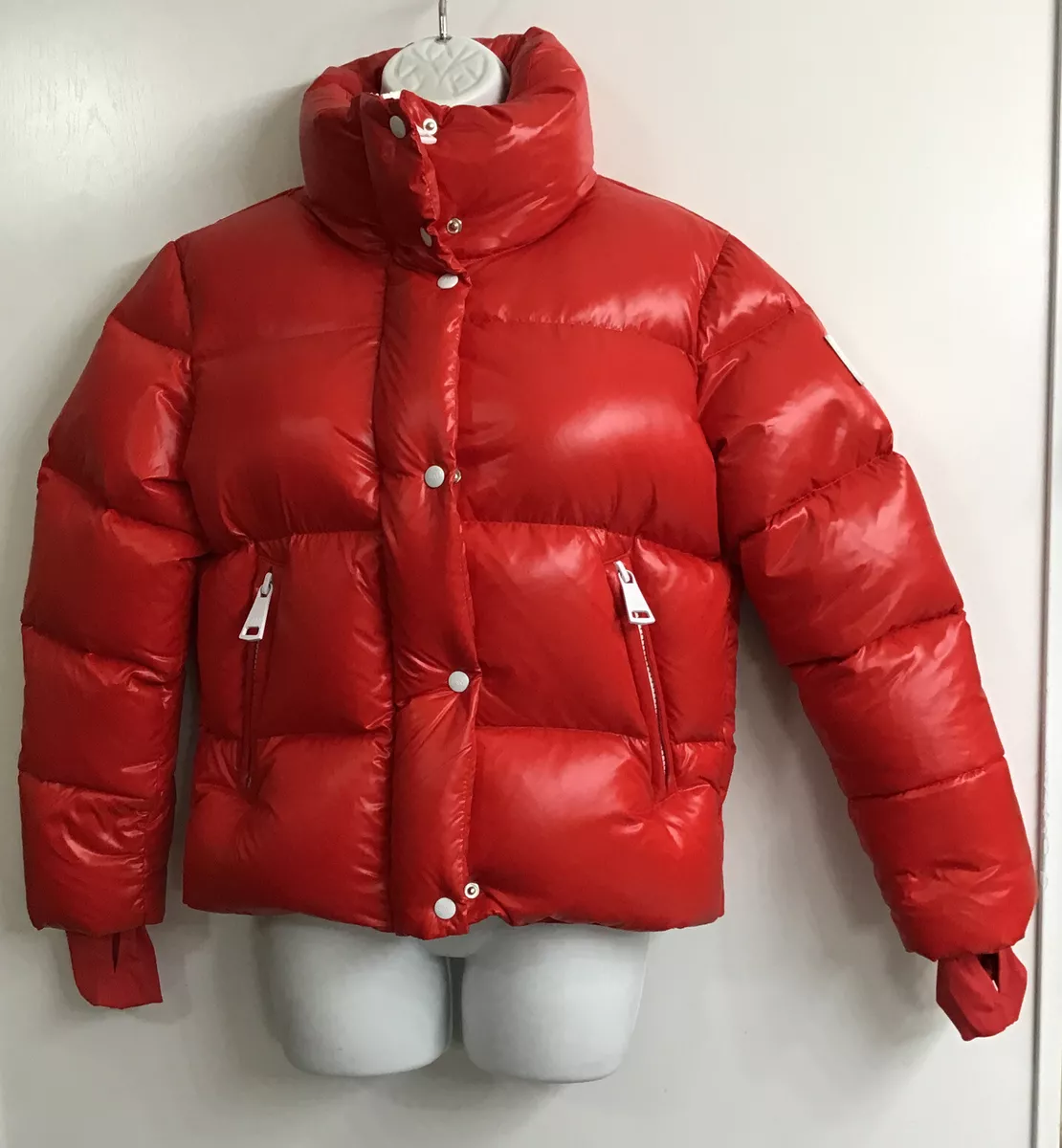 White and 2025 red puffer jacket