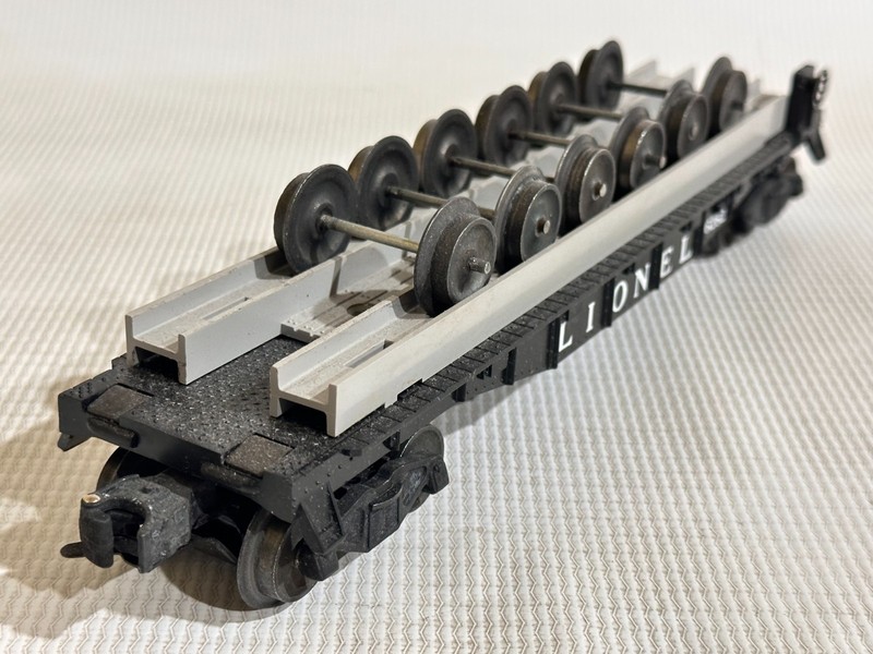 LIONEL POSTWAR NICE 6262 BLACK WHEEL CARRYING CAR W/ SIX SETS OF WHEELS LF