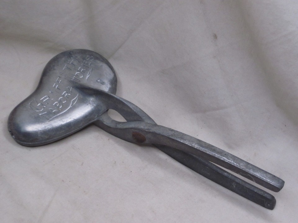 A rare, branded mid-century meat mold/chopper from Griffith Laboratories — a legitimately obscure single-purpose gadget that sparks instant curiosity and conversation.