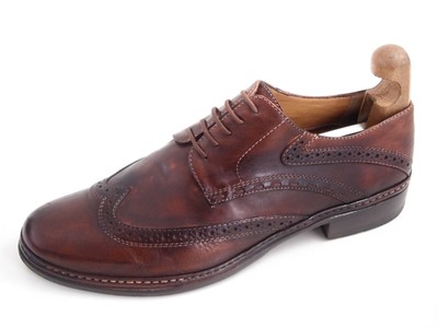 light brown wingtip shoes