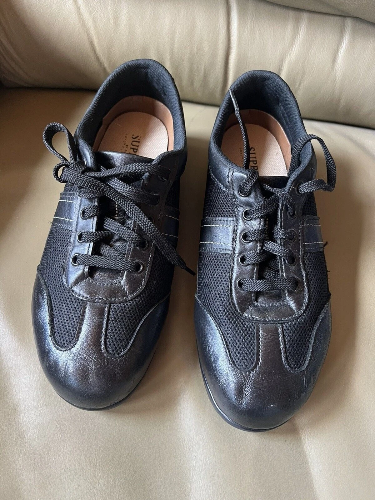 Baskets de marche suprêmes à lacets en cuir noir pour femme SAS   8 W