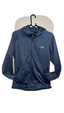 The north face zip up blue track jacket. womens small