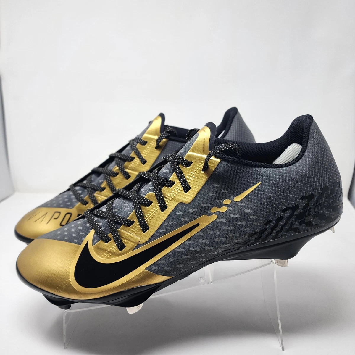 black and gold nike baseball cleats