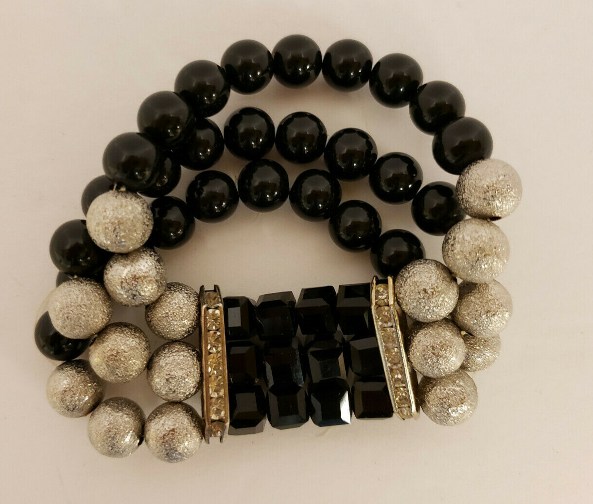 Bracelet Black & Silvertone beads 3 strands 7 in circ. stretchy (J71) Jewelry