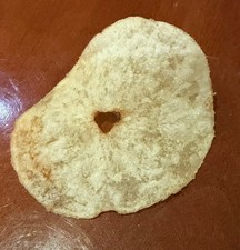 rare pépite de pomme de terre pose en forme de coeur central