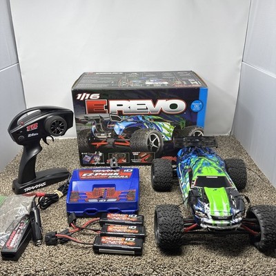 TRAXXAS E-REVO 1/16 SCALE RC CAR With Battery s Dual Charger And More