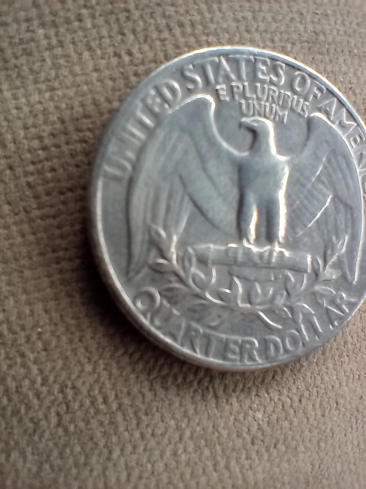 Cuarto de error 1965 sin marca de ceca Foto 3 de 4