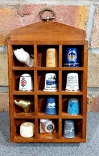 Thimble Display Case With 8 Unique Thimbles, A Brass Elephant And Other Items