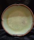 Frankoma pottery plate features the "Prairie Green" Plainsman glaze 10"