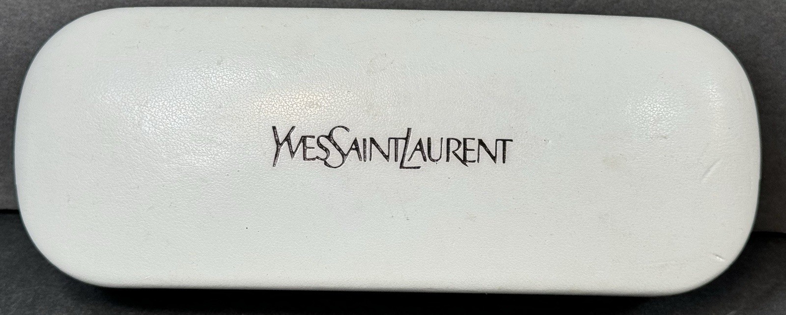 Custodia per occhiali da sole Yves Saint Laurent bianca
