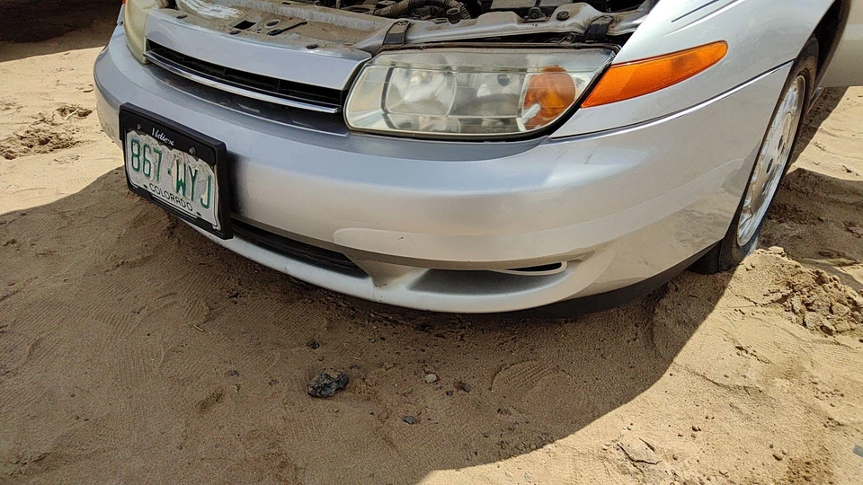 Conjunto de cubierta de parachoques delantero Saturn L100 2000 2001 2002 OEM plateado 12u 21019621 Foto 3 de 4