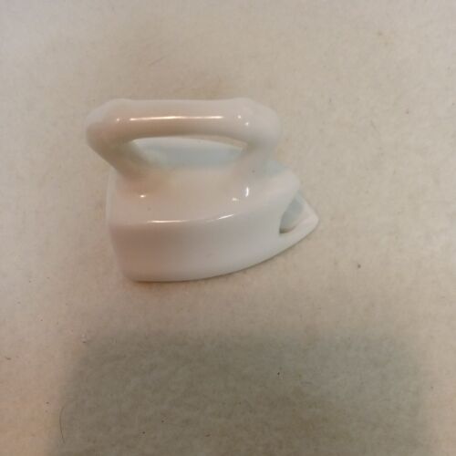 small white ceramic iron figurine, no markings, 1.75 x 2.25 x .75 plus handle